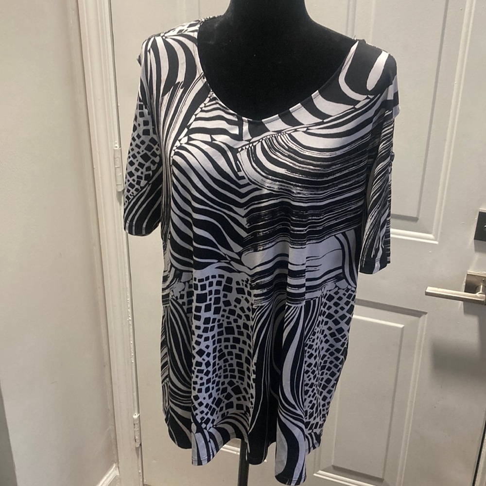 Breezy “cold shoulder” blouse- note the cold shoulder sleeves with silver rings!